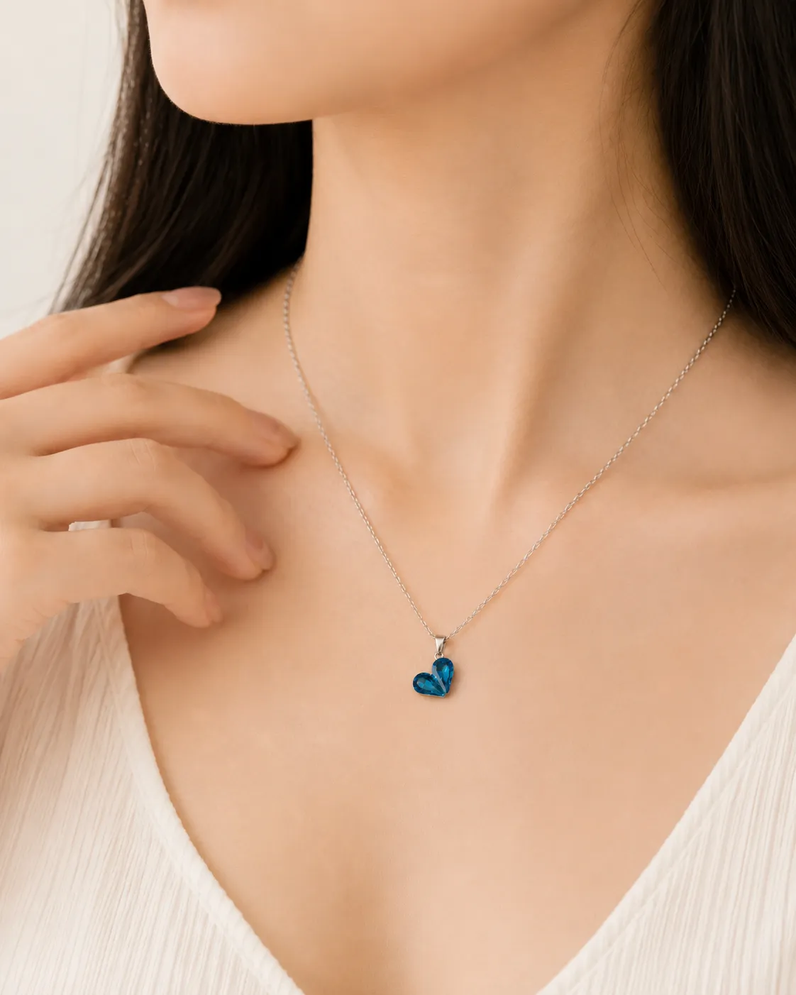 Ocean Gem Heart Pendant Necklace Ocean Gem Heart Pendant Necklace featuring a sparkling blue heart crystal on a premium silver chain