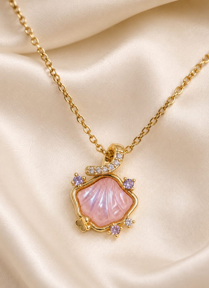 Pink Blossom Crystal Pendant Necklace featuring a blush pink shell-inspired pendant with sparkling crystal accents