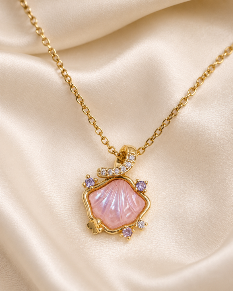 Pink Blossom Crystal Pendant Necklace featuring a blush pink shell-inspired pendant with sparkling crystal accents