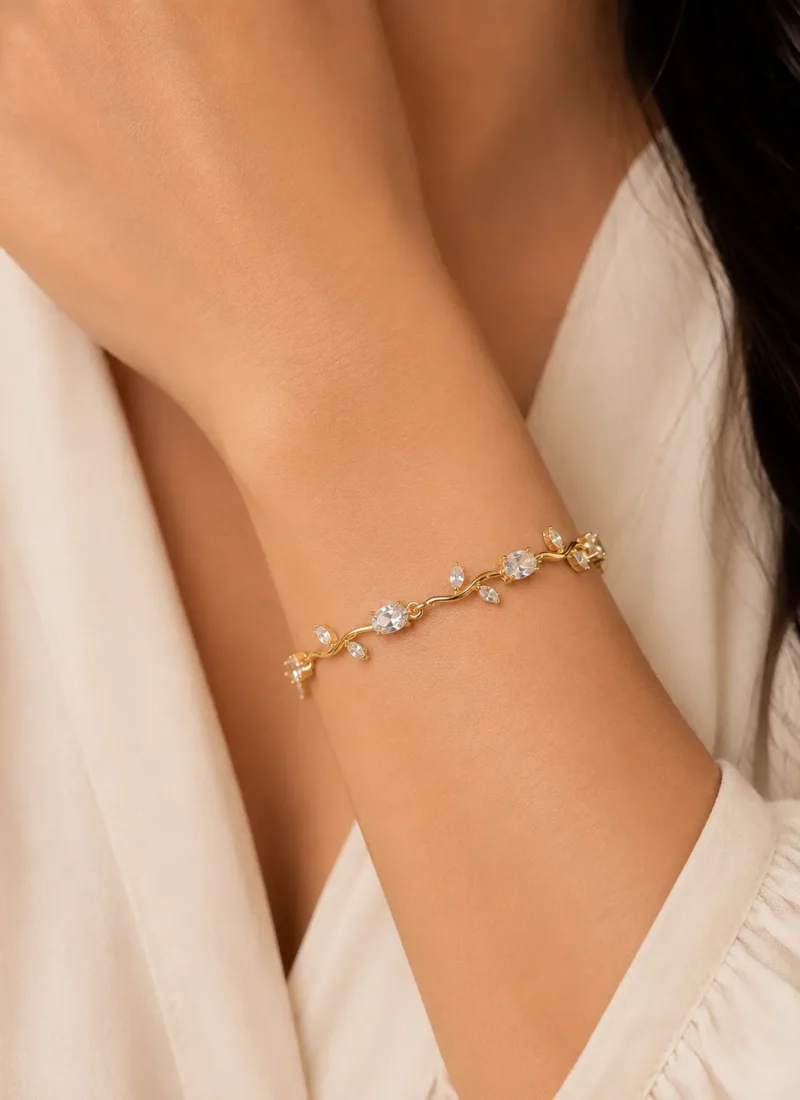 Celeste Crystal Gold Bracelet with Oval Crystal Design for Women