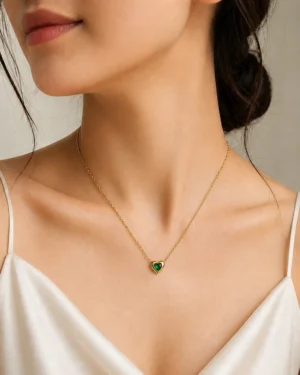 Green Heart Pendant Necklace featuring an emerald-green heart crystal set in a premium gold heart frame