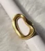 Gold tone sculptural open statement ring