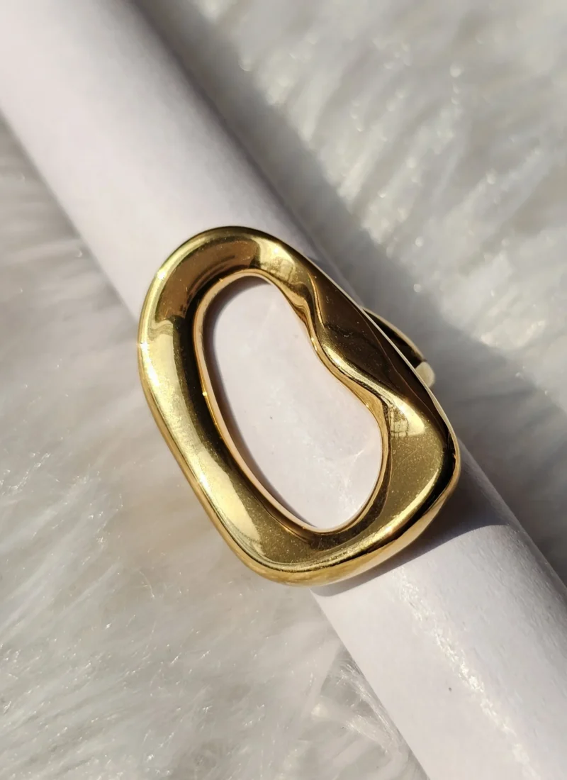 Gold tone sculptural open statement ring