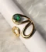 Gold tone green stone sculptural open statement ring