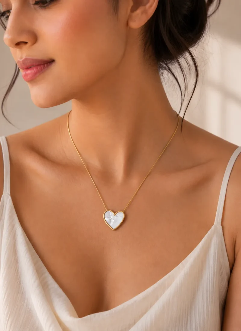 Gold tone heart pendant necklace close-up